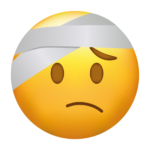 A sad faced emoji has a bandage around its head