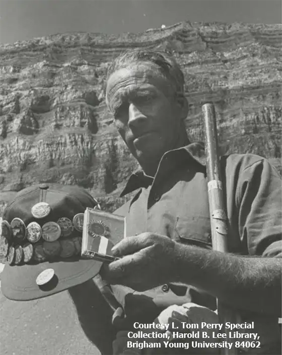 Alfred Pace is shown with a Timp stick and a hat with many of his Timp badges during the 39th annual Timp hike